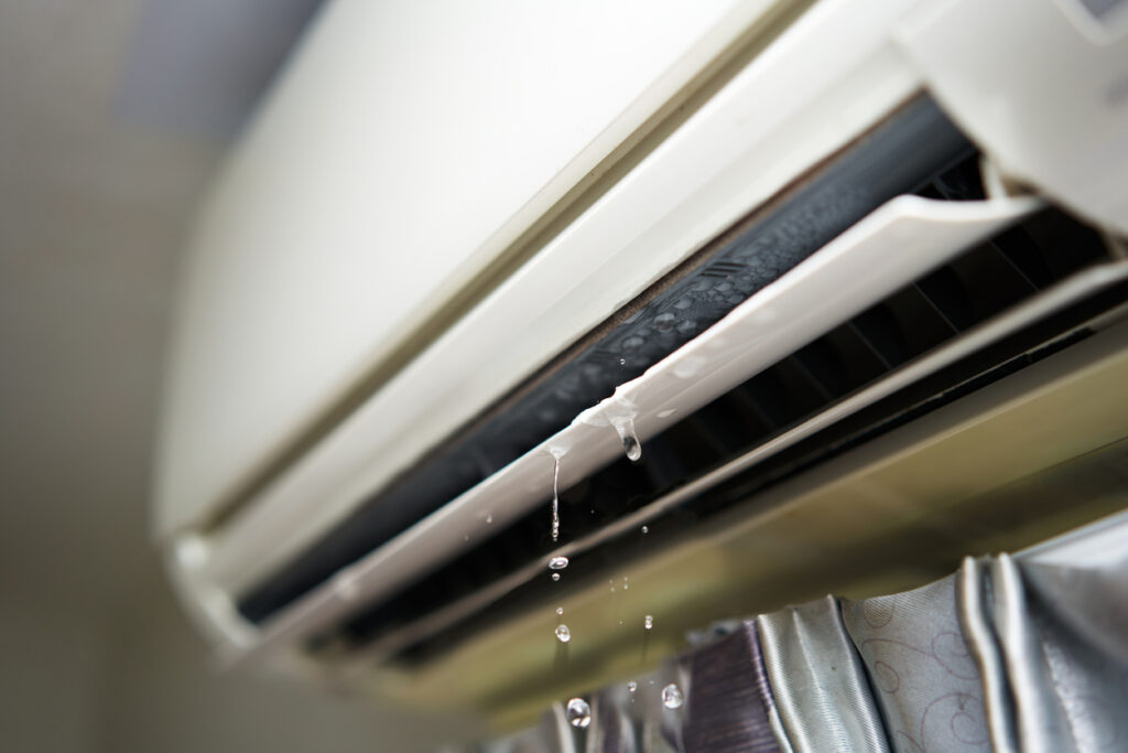 Water leaking from the indoor component of an air conditioner.