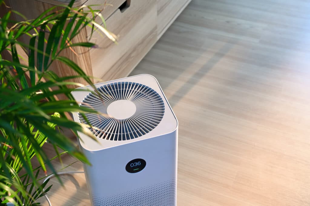 Air purifier on wooden floor in home